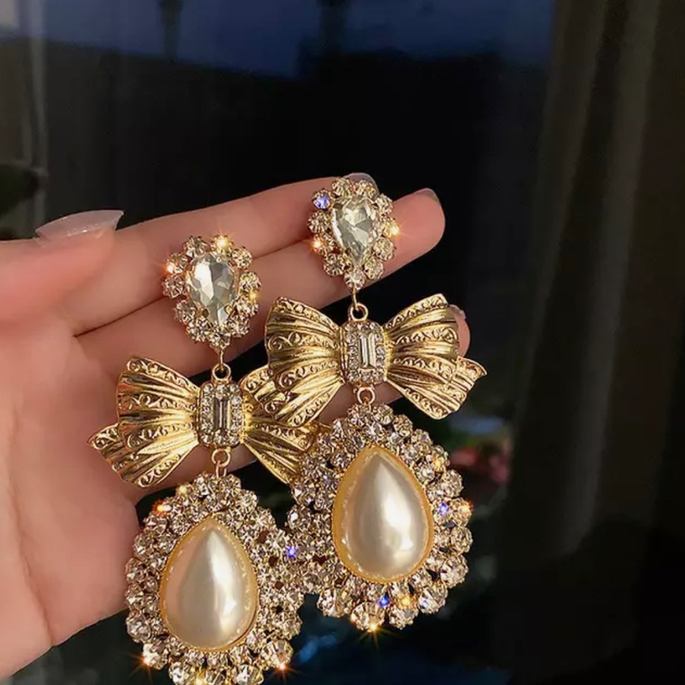 Brand new gold earrings